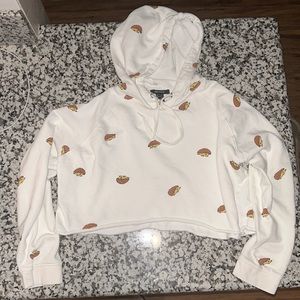 Forever 21, Women’s Size Large crop-top. White/cream color w/hedgehogs